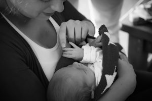 Black and white image of Mother and newborn daughter