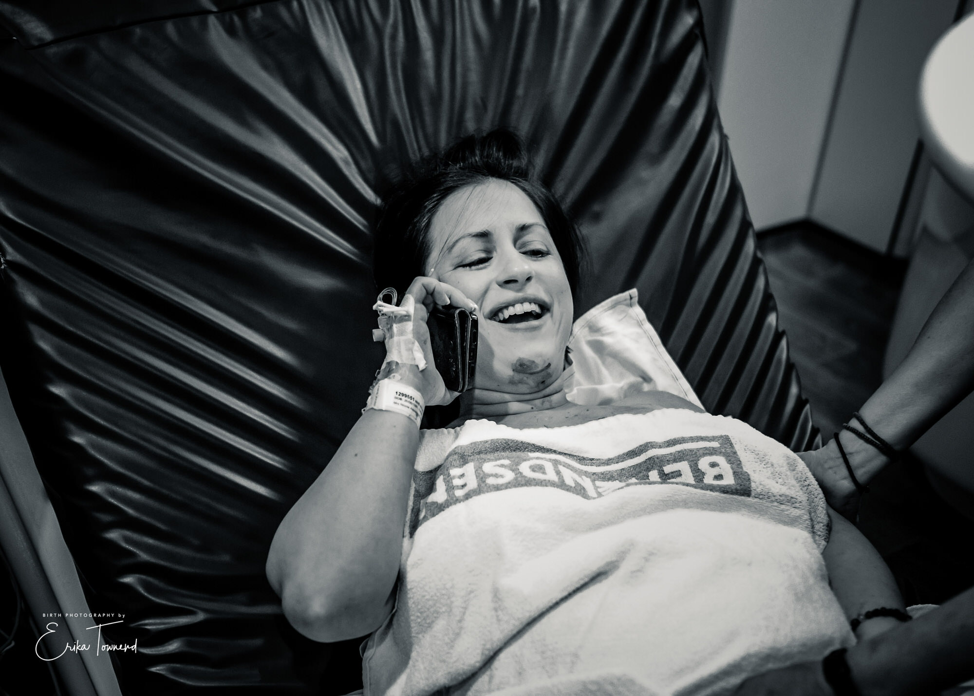Erika Townend Birth photography in black and white a mother sharing her news of the birth of her baby