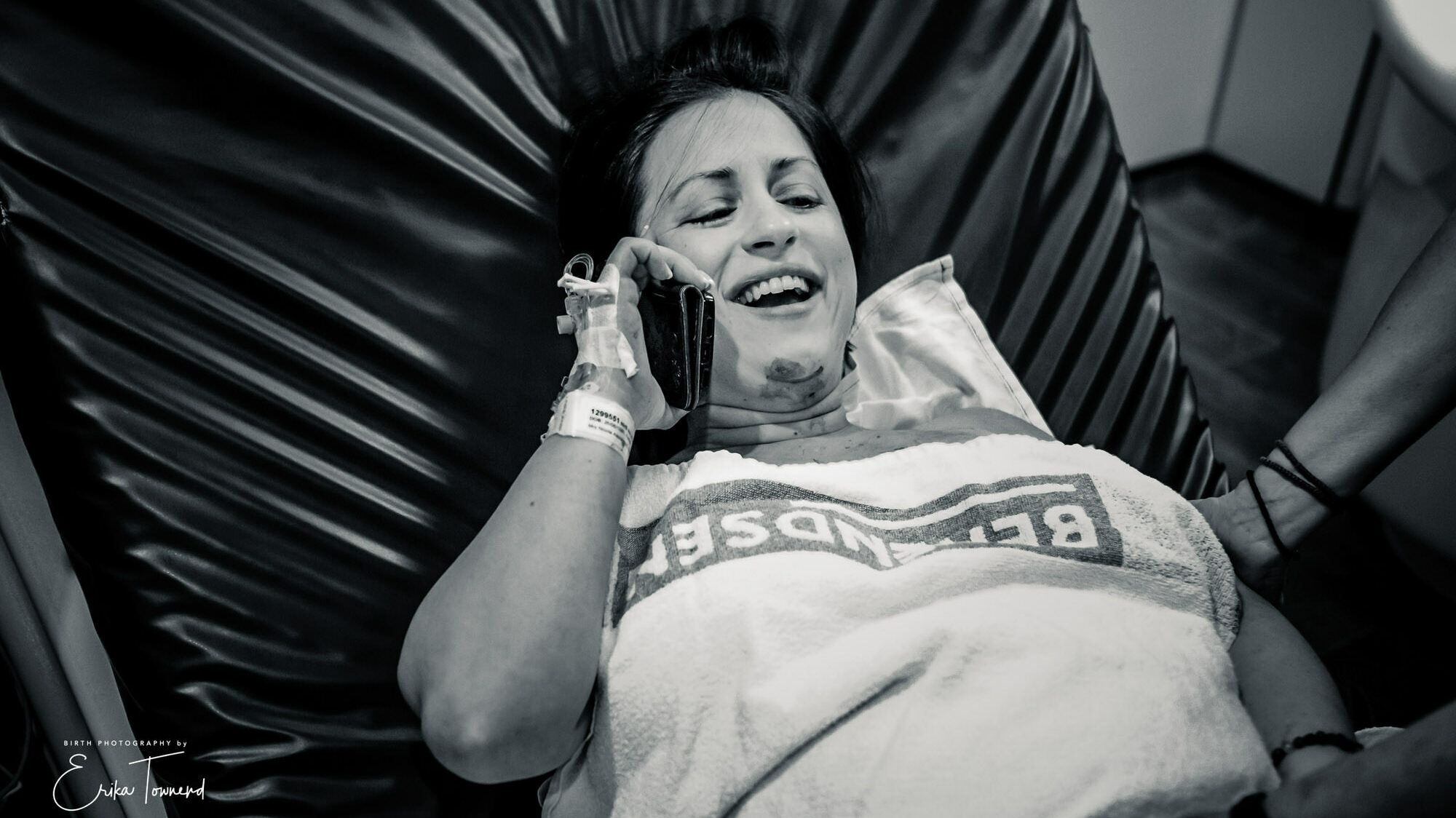 Erika Townend Birth photography in black and white a mother sharing her news of the birth of her baby